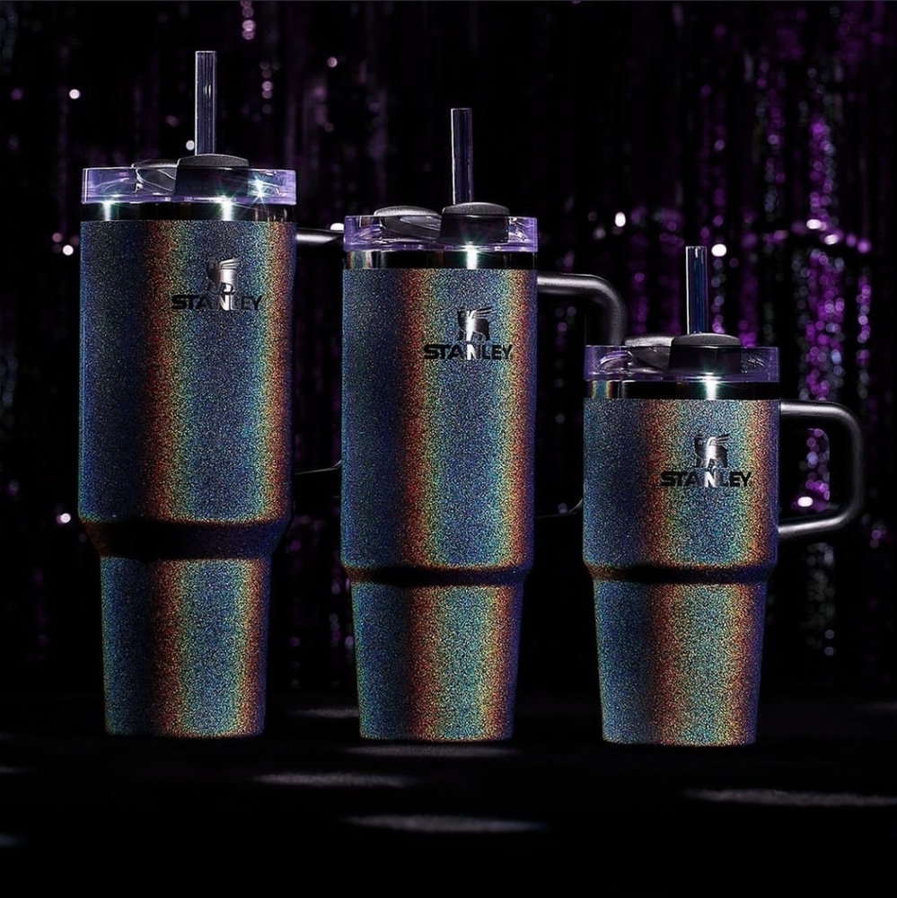 Brand new. In box limited Stanley Midnight shimmer 30oz